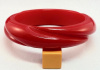 BB653 twist carved red bakelite bangle